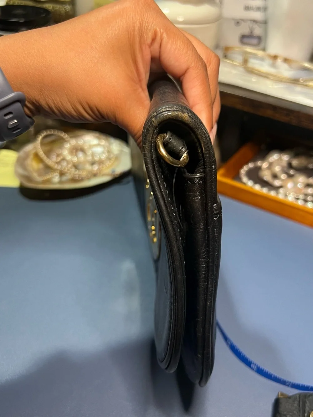Pre-loved Tory Burch Black Leather clutch with Gold hardware